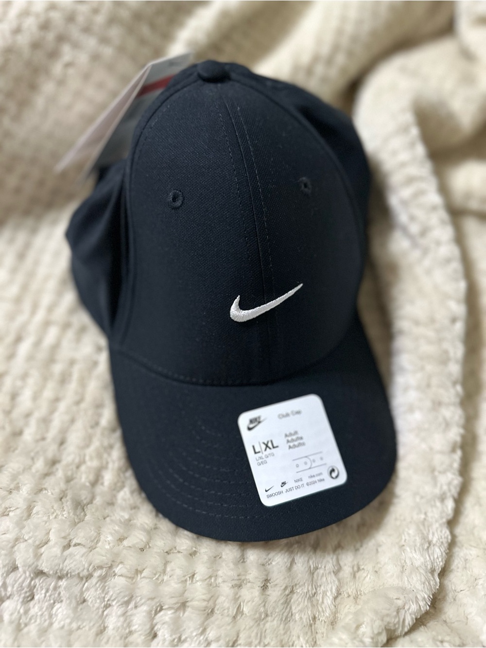 Nike Black Cap with White Swoosh Logo